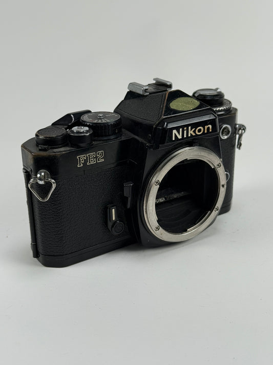 Nikon FE2 Black 35mm SLR Film Camera Body - Heinz Kluetmeier
