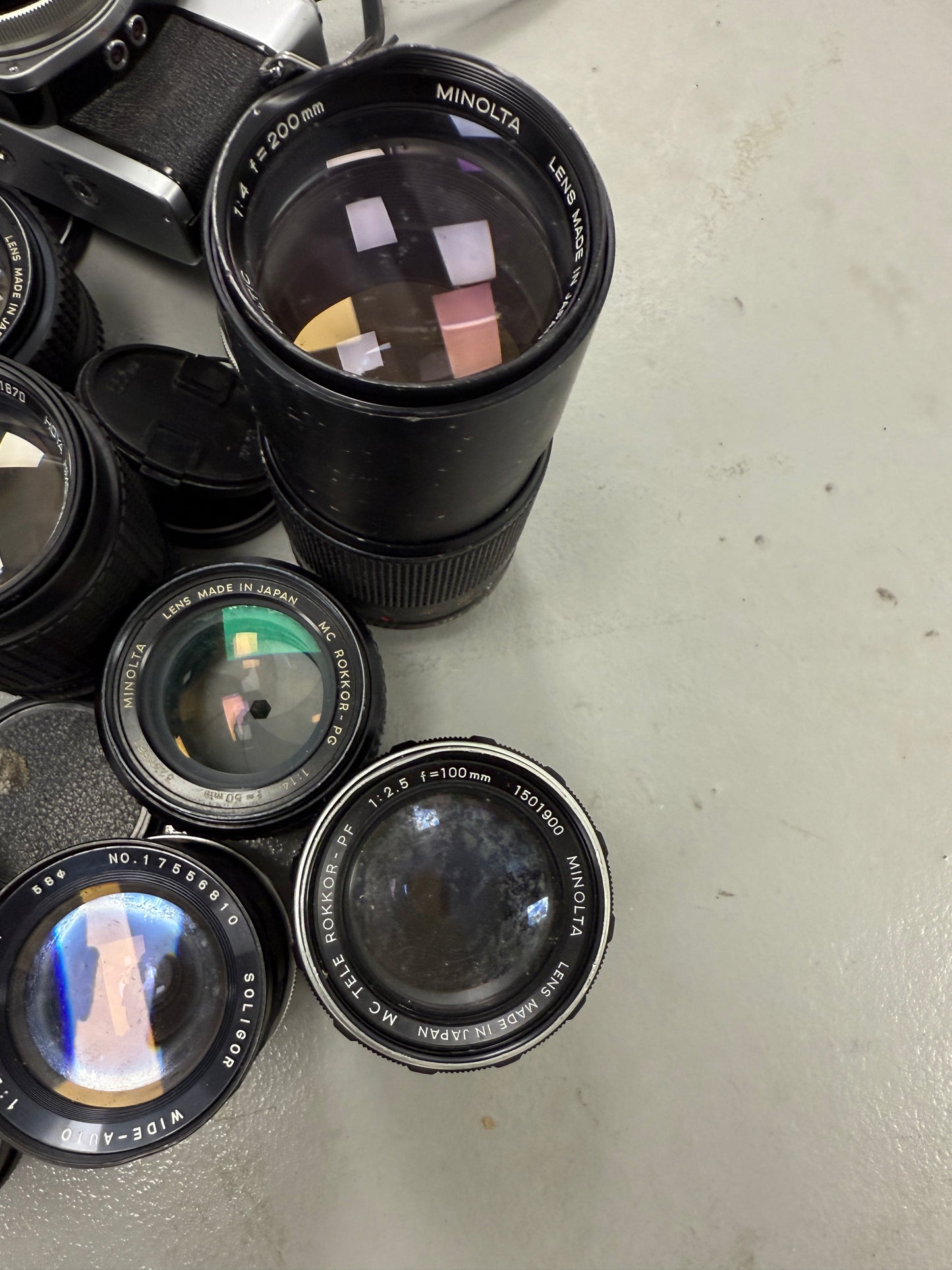 Minolta Film camera equipment lot lens, 135mm, 100mm f2.5, 58mm, 50mm, SRT