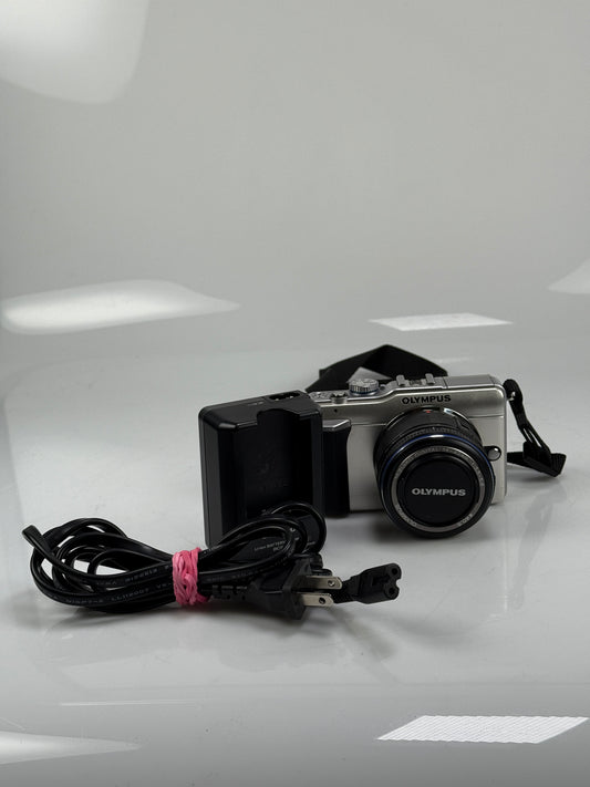 Olympus E-PL1 12.3MP mirrorless digital camera body Silver with 14-42mm L ED lens