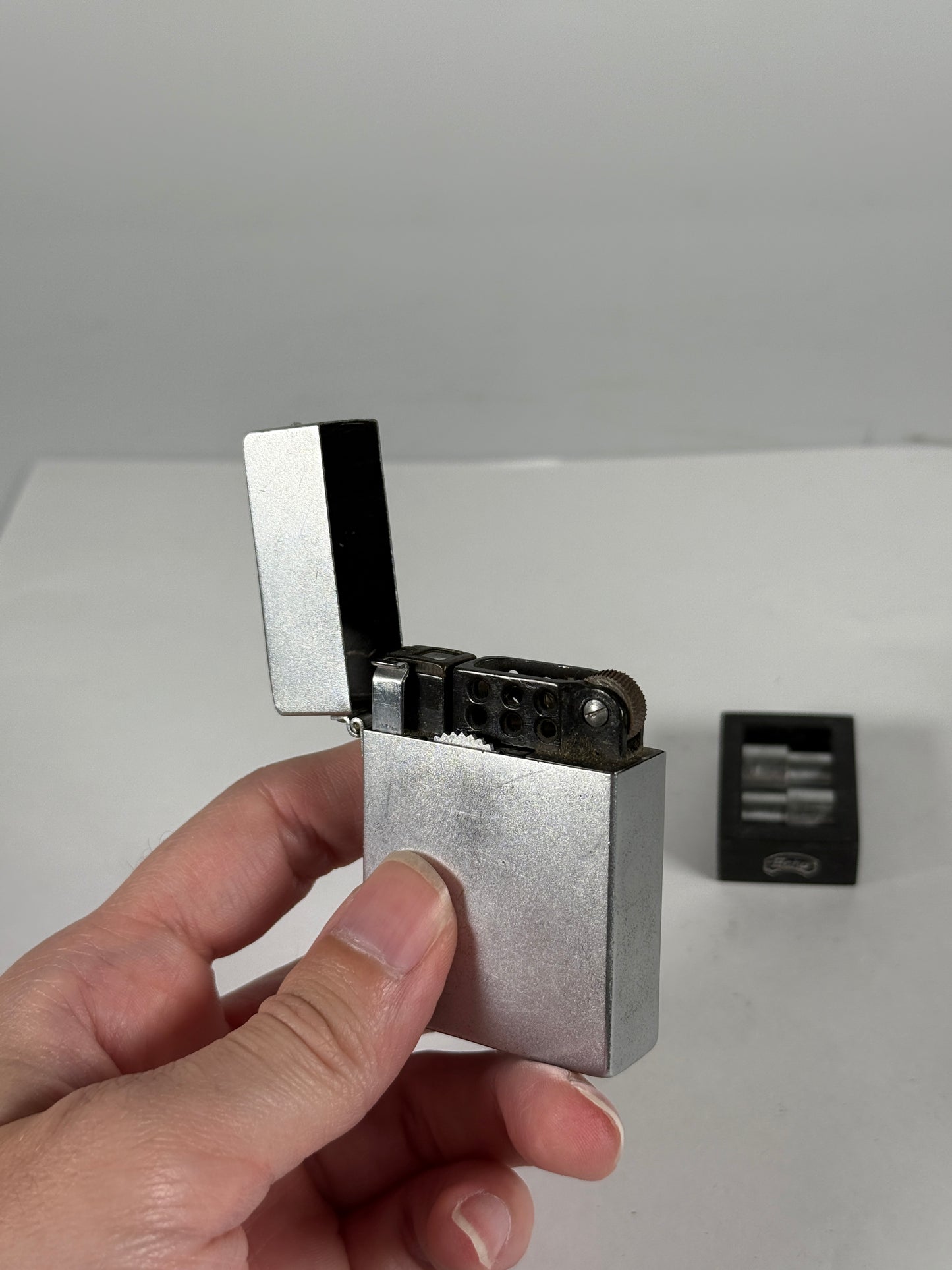 A Suzuki Optical Co. Echo 8 Cigarette Lighter Camera,