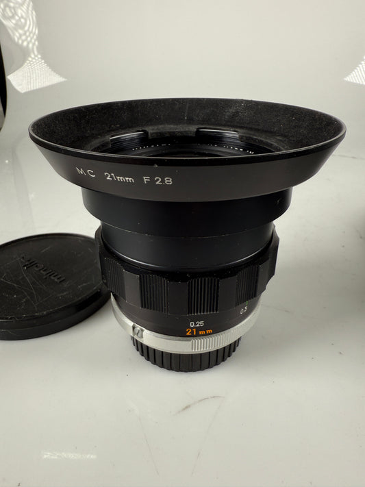 Minolta MC W. Rokkor - NL 21mm f2.8 wide angle lens with hood