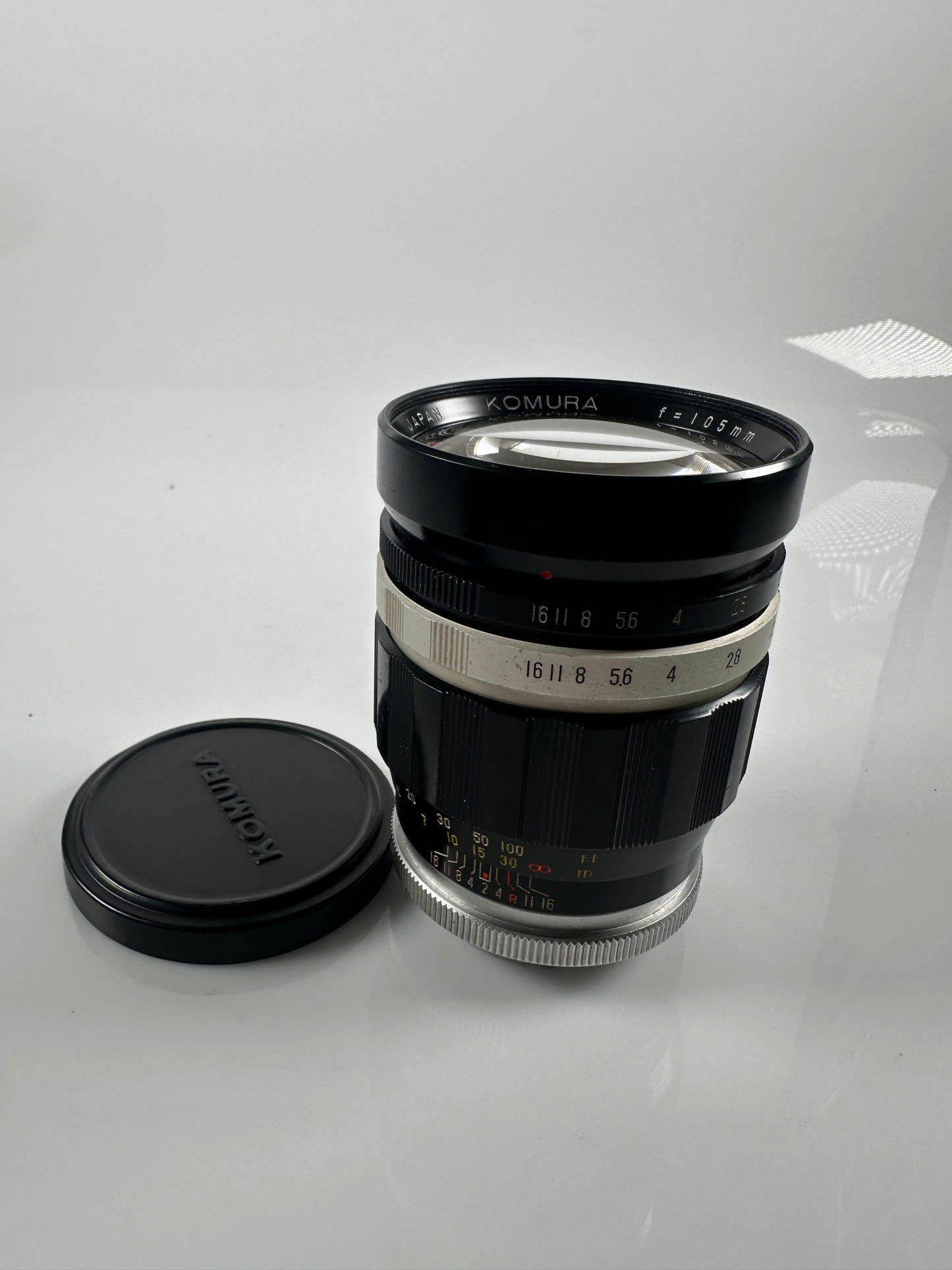 Sankyo Kohki Komura 2/105mm Lens T mount w/ Minolta MD adapter