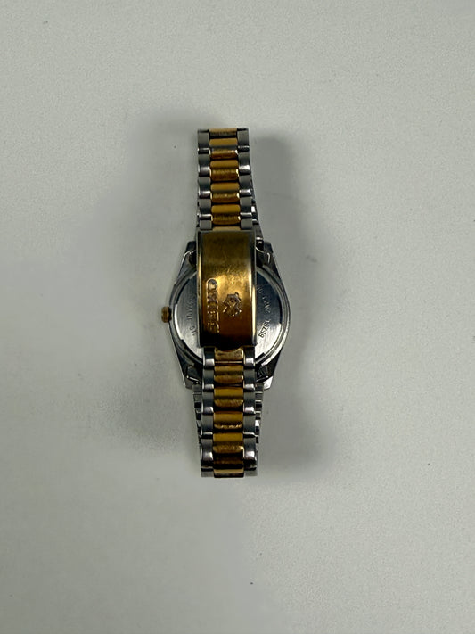 Seiko Quartz Womens Two-Tone Day/Date Silver Dial Dress Watch Model 2A23-0039