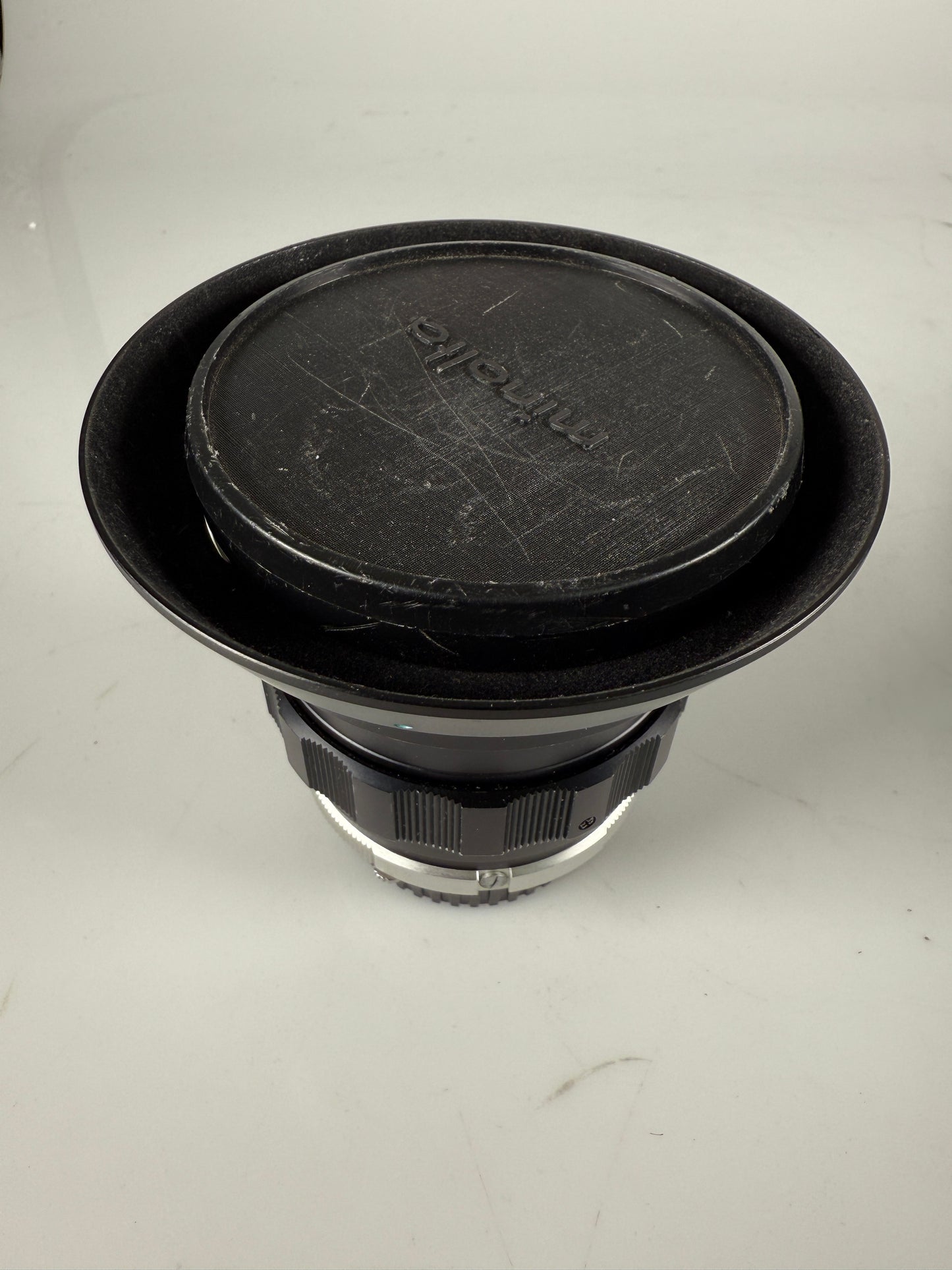 Minolta MC W. Rokkor - NL 21mm f2.8 wide angle lens with hood
