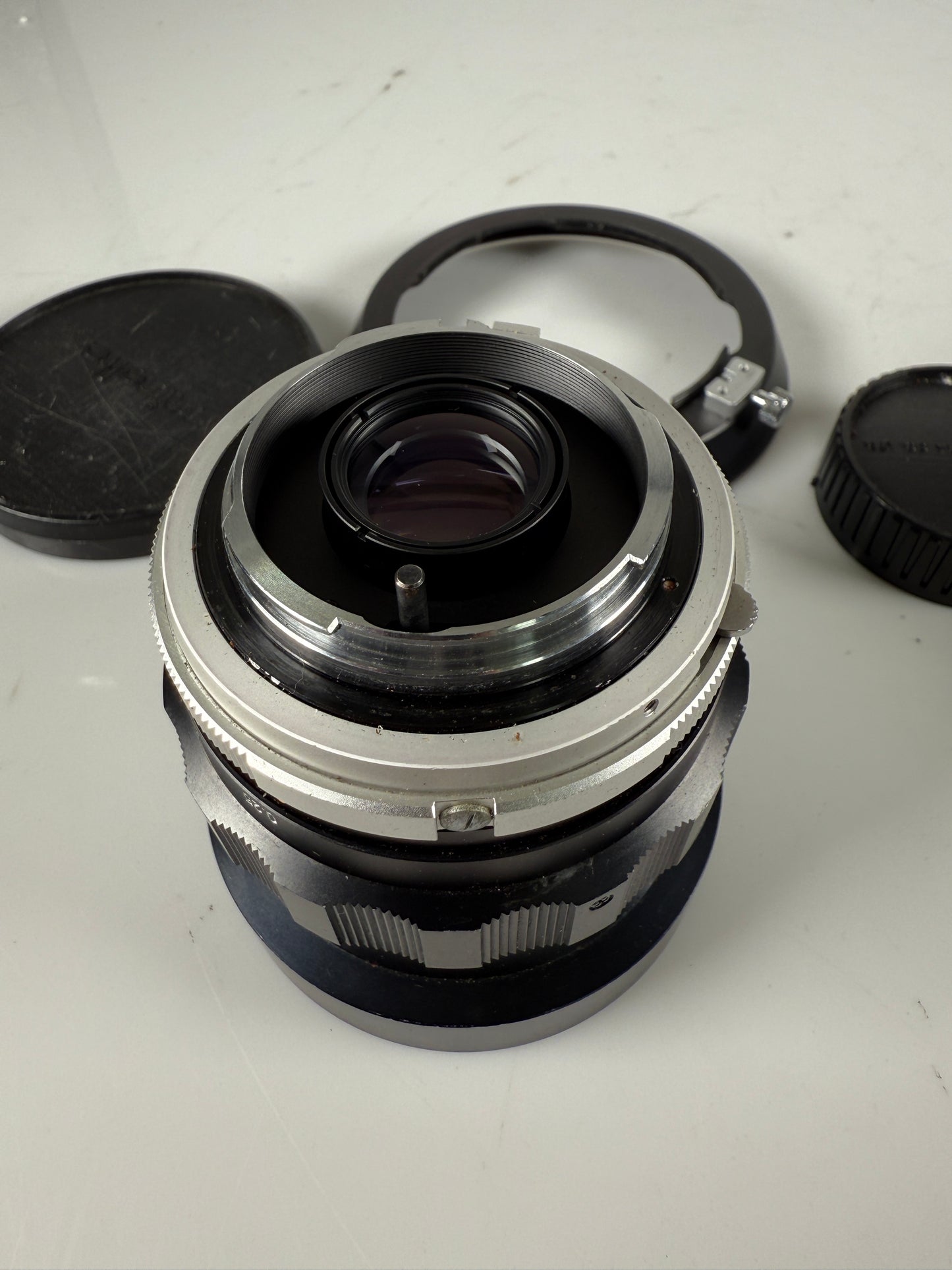 Minolta MC W. Rokkor - NL 21mm f2.8 wide angle lens with hood