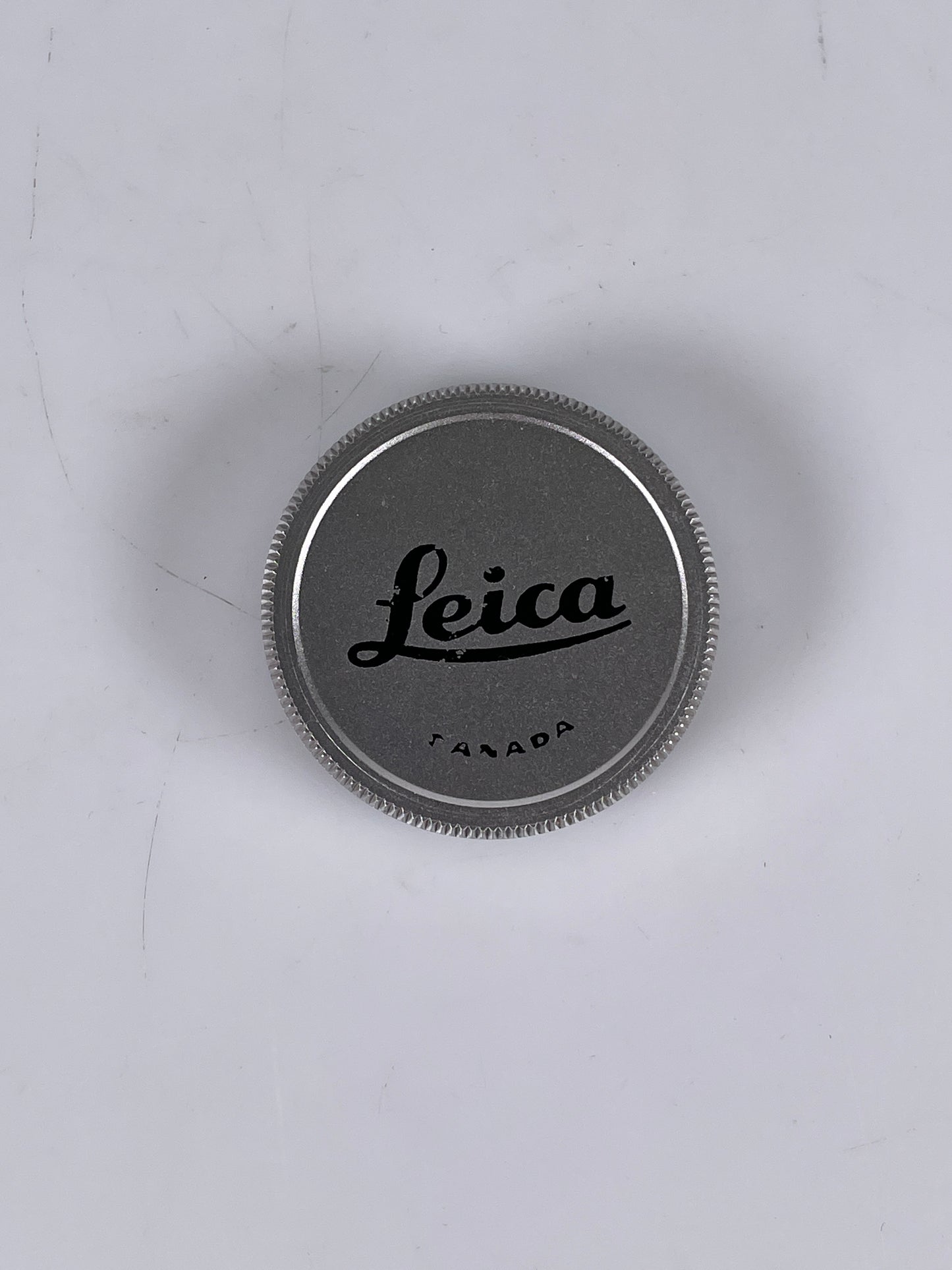 Leica screw in front lens cap for E39 marked Canada