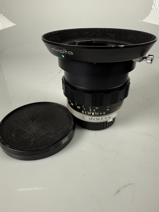 Minolta MC W. Rokkor - NL 21mm f2.8 wide angle lens with hood