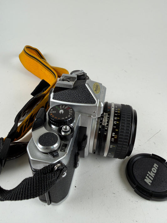 Nikon FE Chrome 35mm SLR Film Camera Body w/ 50mm f1.8 ais lens