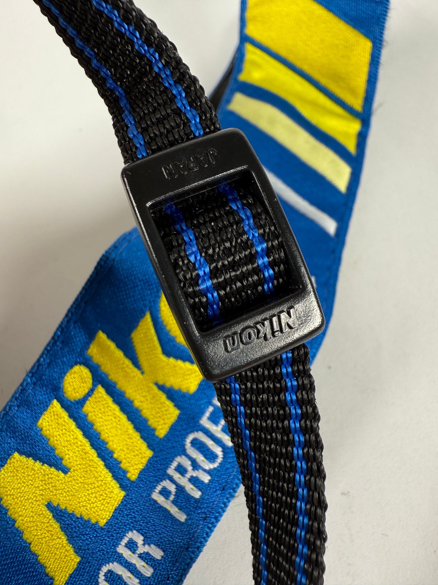 Nikon NPS Strap Limited Nikon Professional Services Strap Blue Yellow