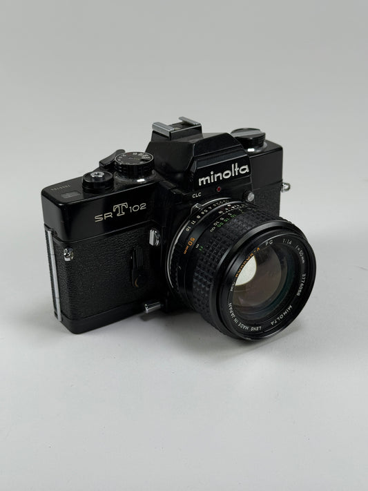 Minolta SRT 102 Black 35mm film camera kit with 50mm f1.4 rokkor-x lens