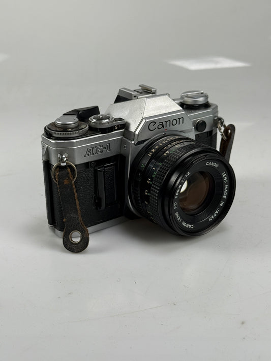 CANON AE-1 chrome SLR 35mm Film Camera with 50mm f1.8 FD KIT