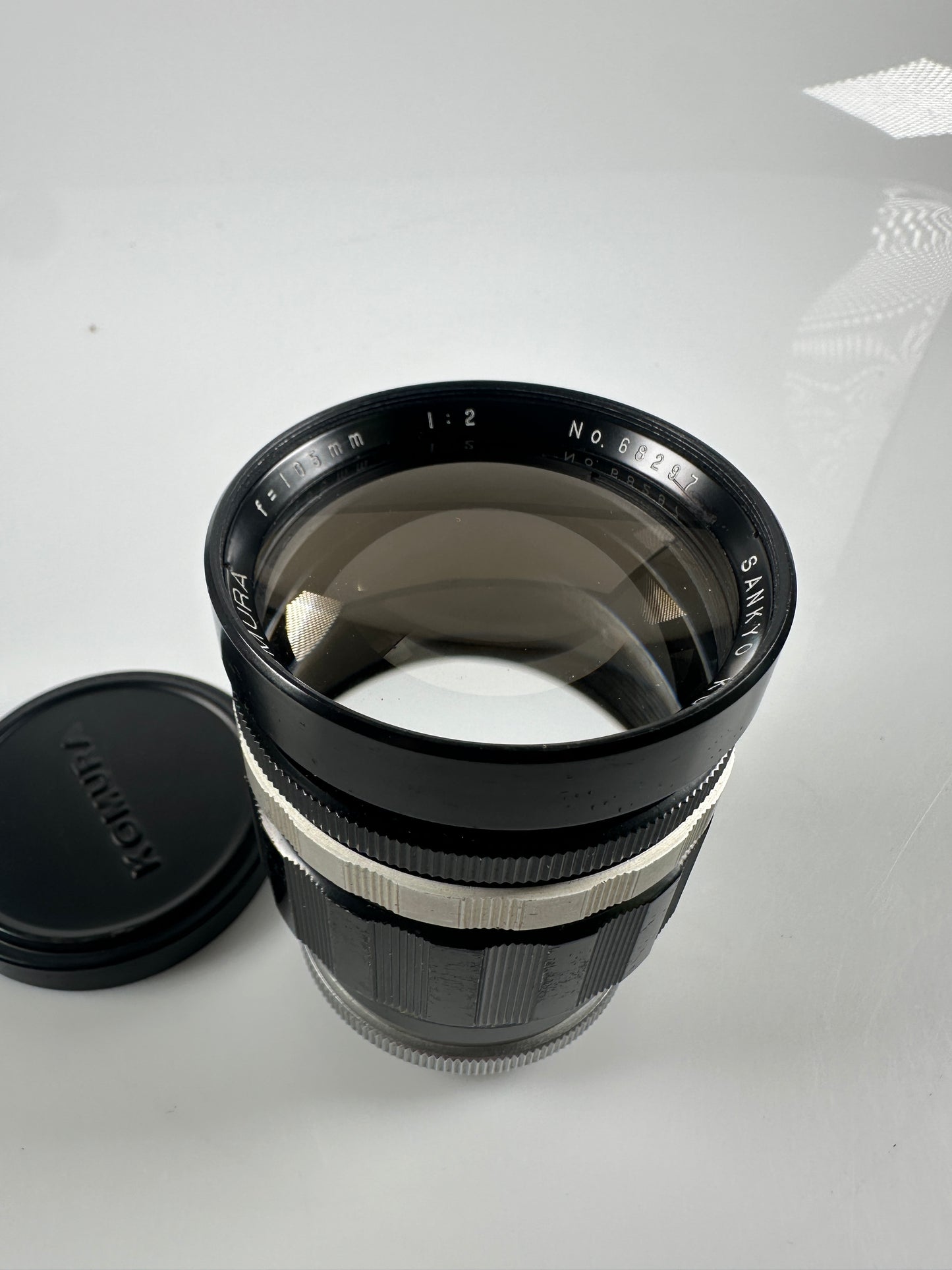 Sankyo Kohki Komura 2/105mm Lens T mount w/ Minolta MD adapter