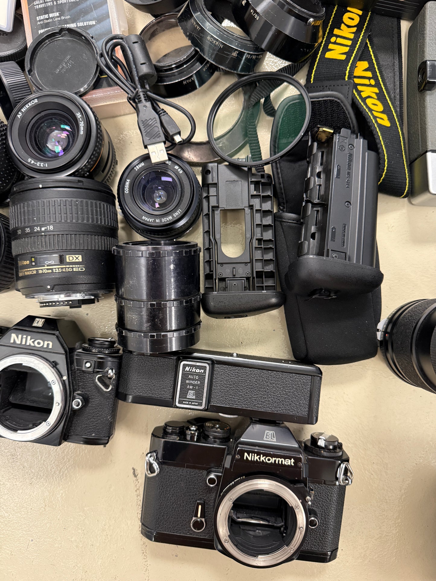 Nikon Film camera equipment lot lens, flash, caps, hood, strap