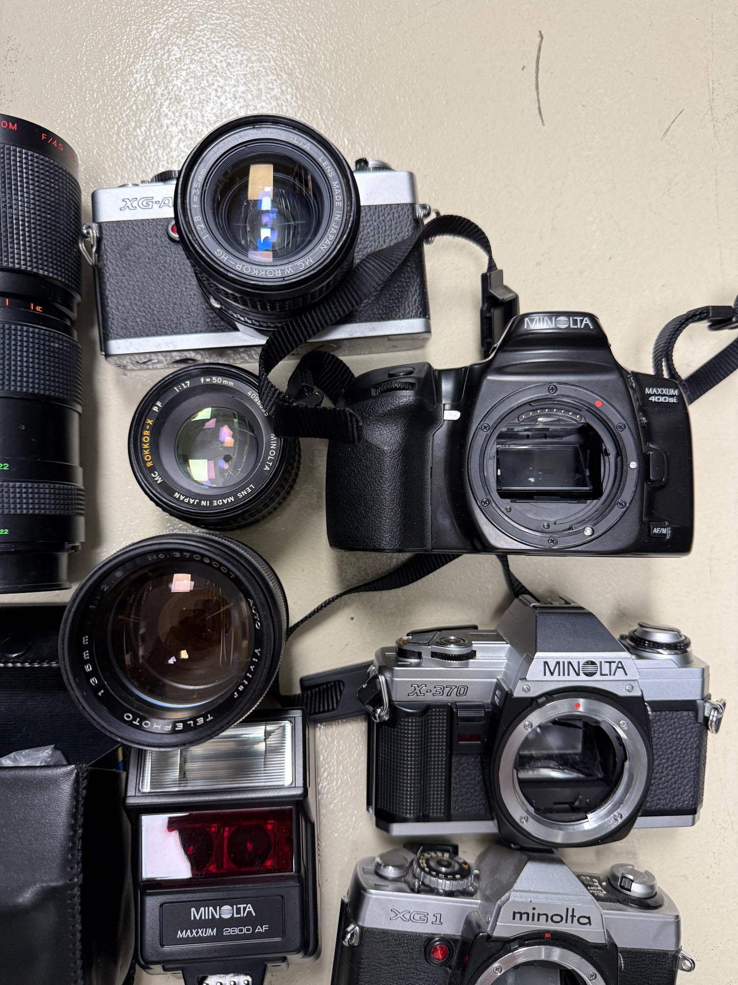 Minolta Film camera MF and AF equipment lot lens, flash