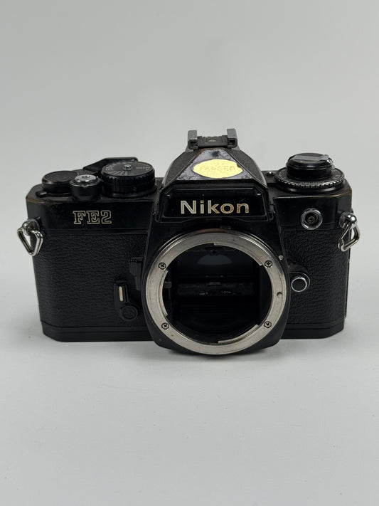 Nikon FE2 Black 35mm SLR Film Camera Body - Heinz Kluetmeier