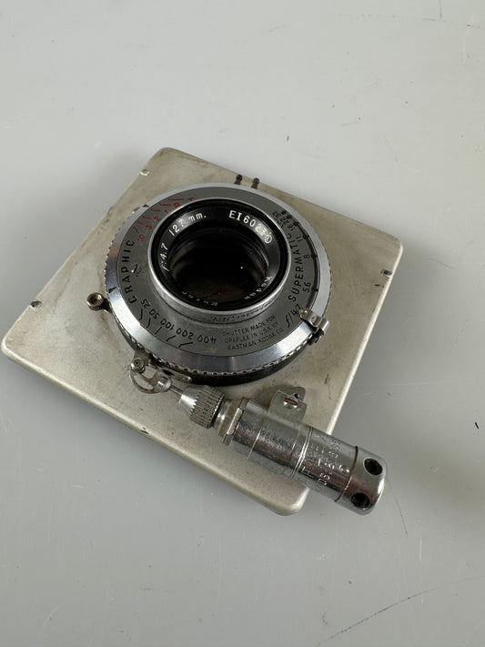 Kodak Ektar 127mm f4.7 large format lens in shutter on graflex board