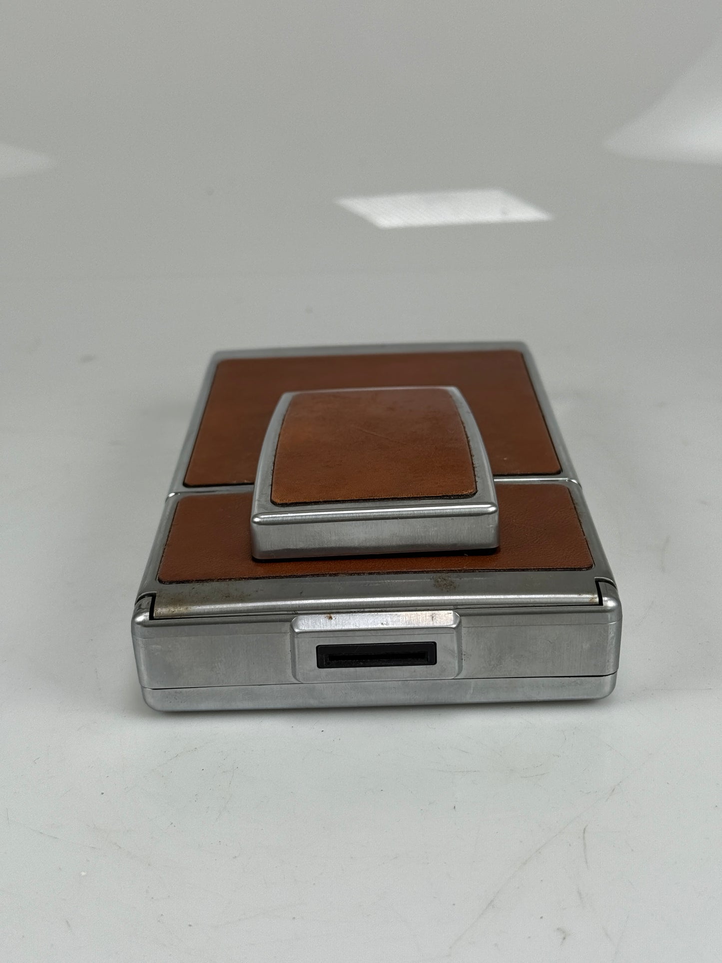 Polaroid SX-70 film land camera tan and chrome