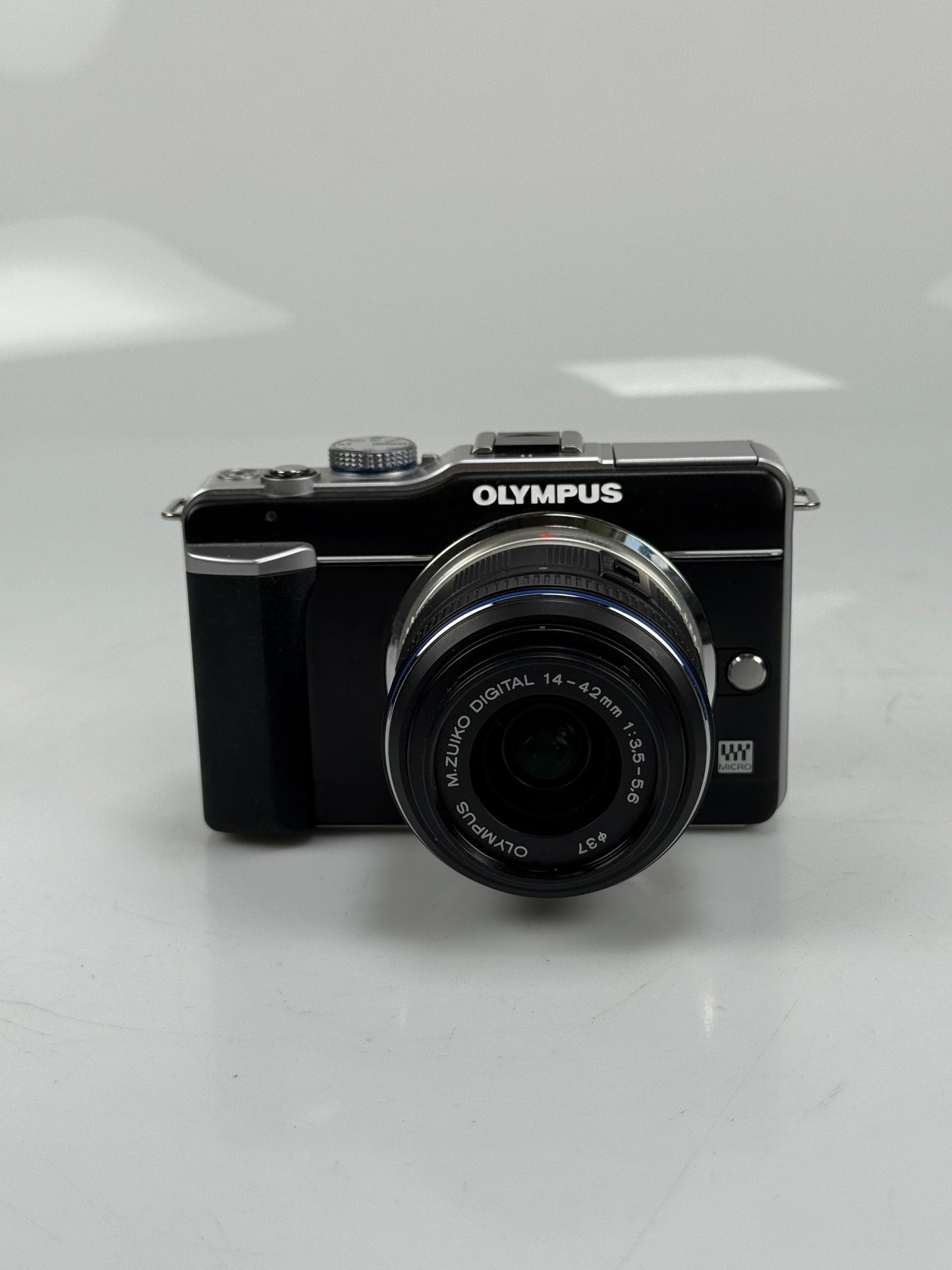 Olympus E-PL1  12.3MP mirrorless digital camera body black with 14-42mm L ED lens