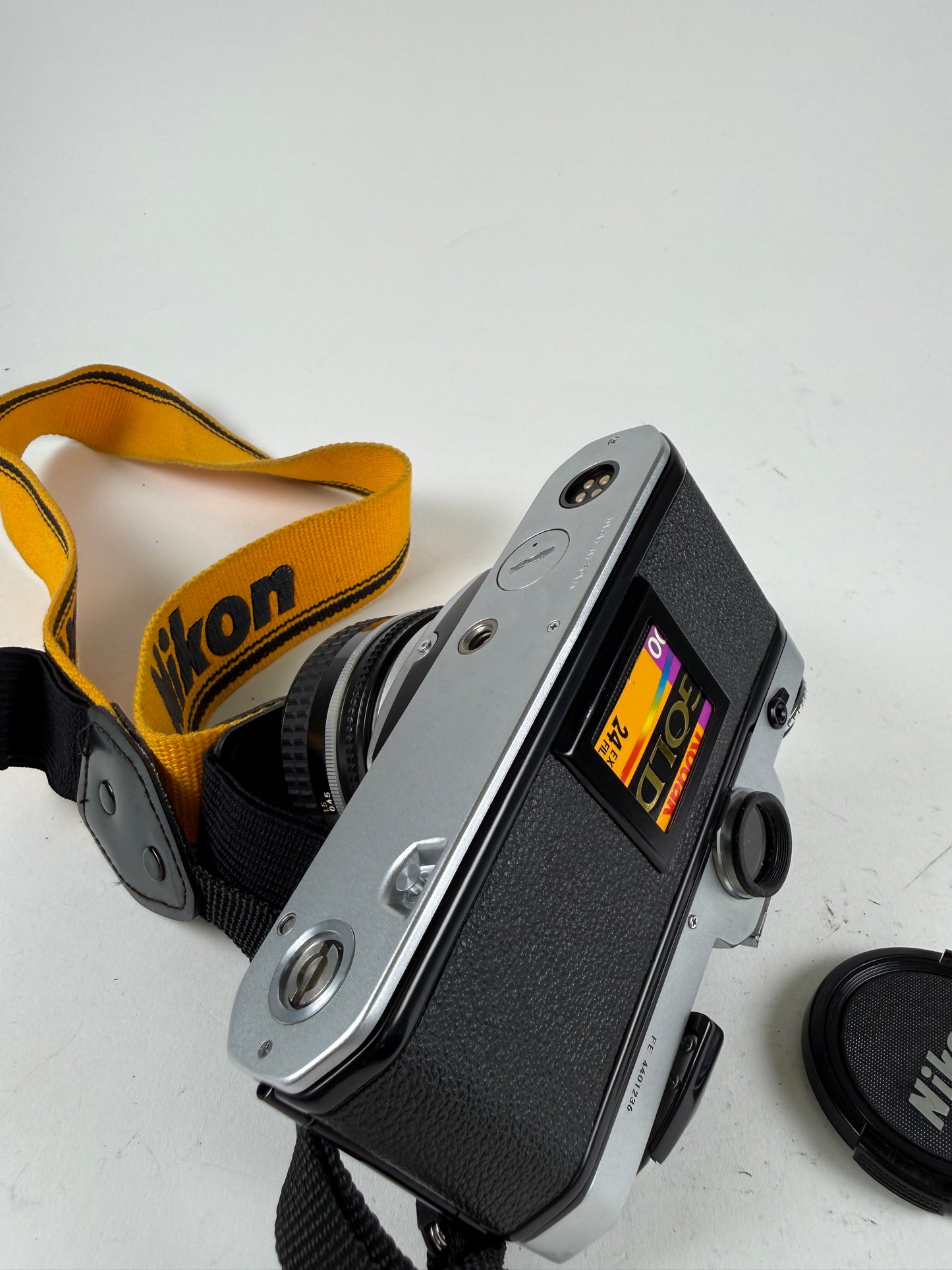 Nikon FE Chrome 35mm SLR Film Camera Body w/ 50mm f1.8 ais lens