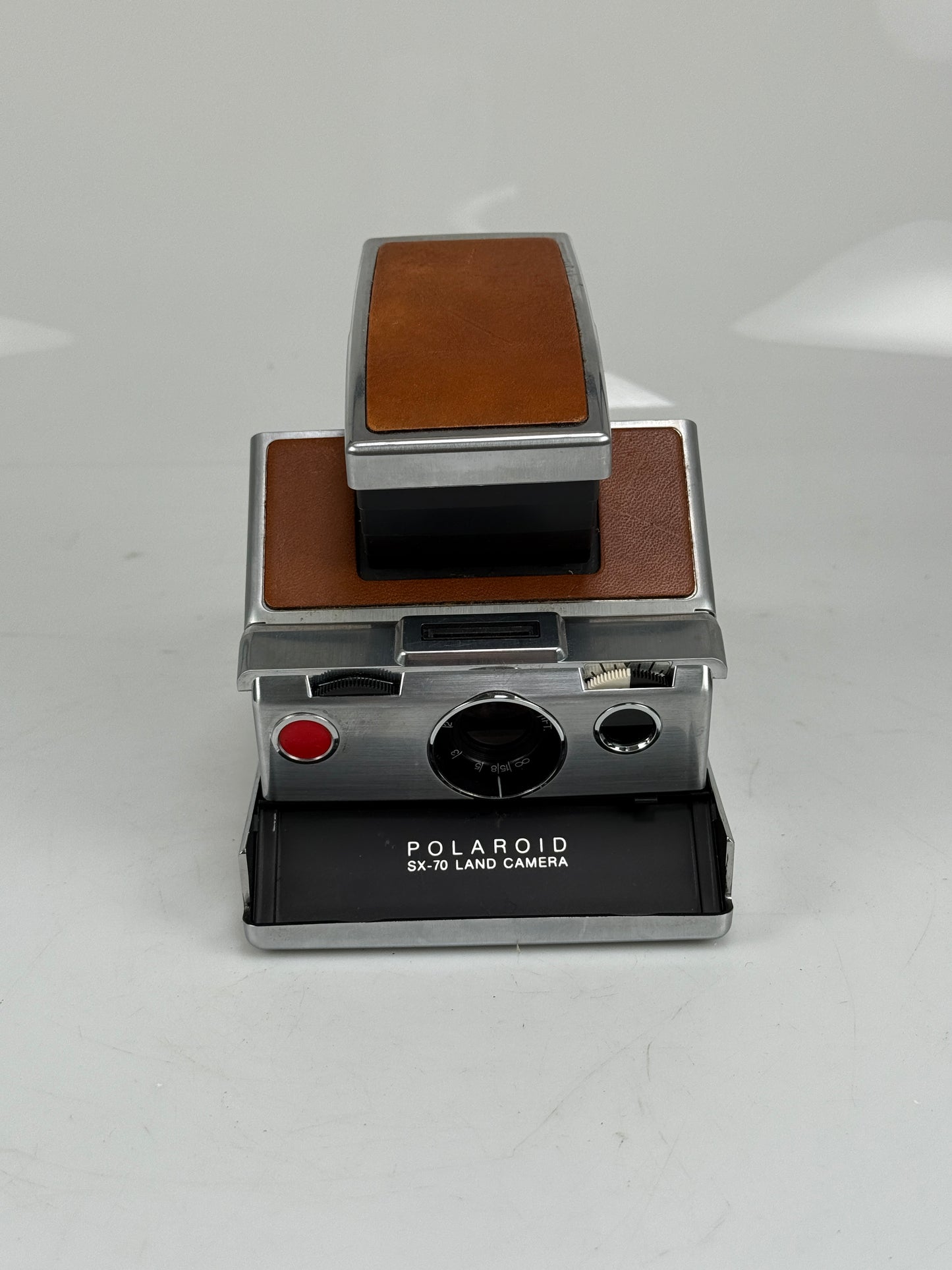 Polaroid SX-70 film land camera tan and chrome
