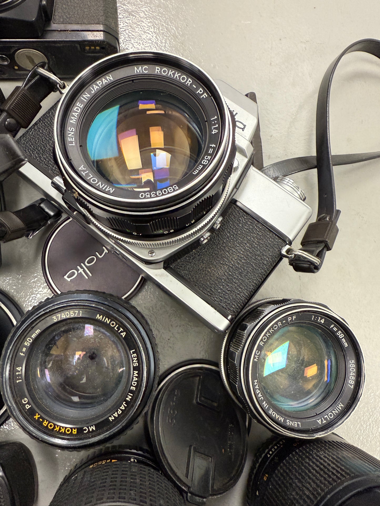 Minolta Film camera equipment lot lens, 135mm, 100mm f2.5, 58mm, 50mm, SRT