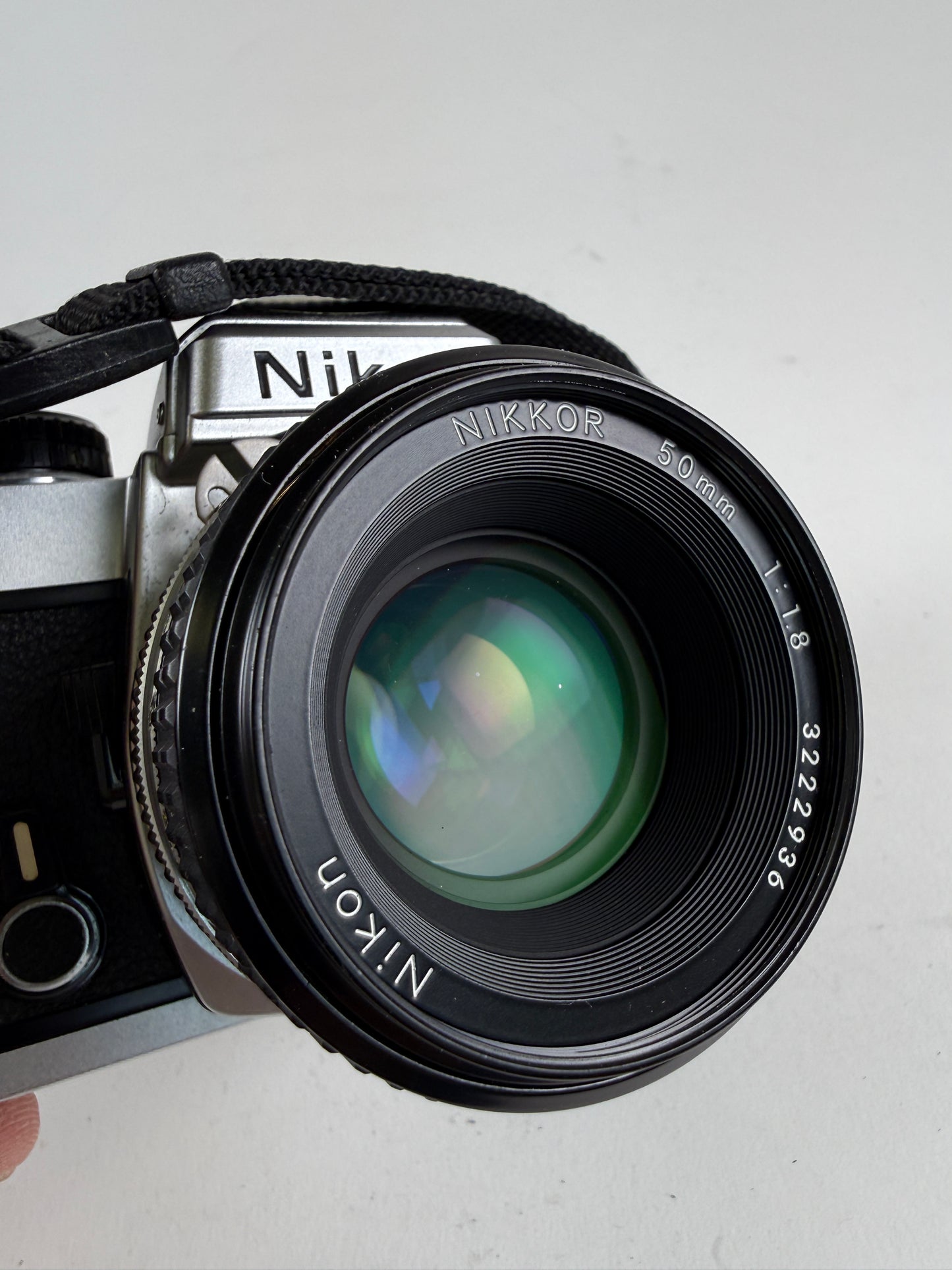Nikon FE Chrome 35mm SLR Film Camera Body w/ 50mm f1.8 ais lens