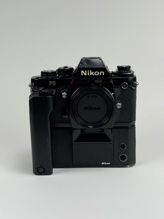 Nikon F3 35mm SLR film camera body w/ MD-4 - Heinz Kluetmeier