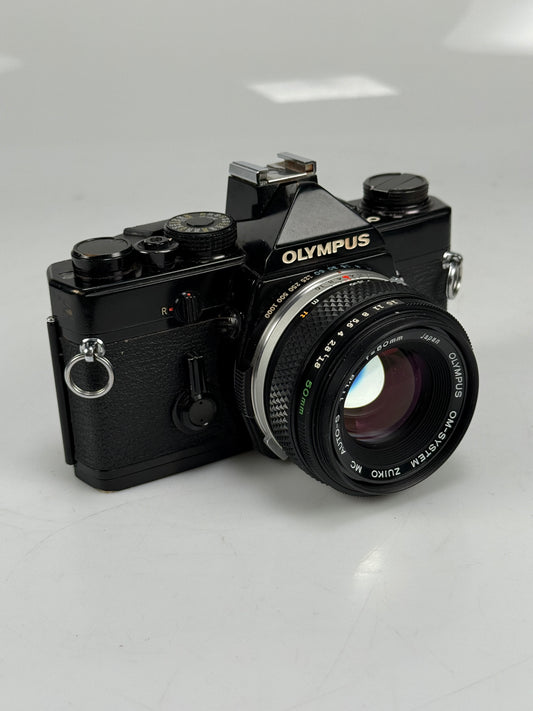 Olympus OM 1 35mm SLR Film Camera MC 50mm f/1.8 Lens Black