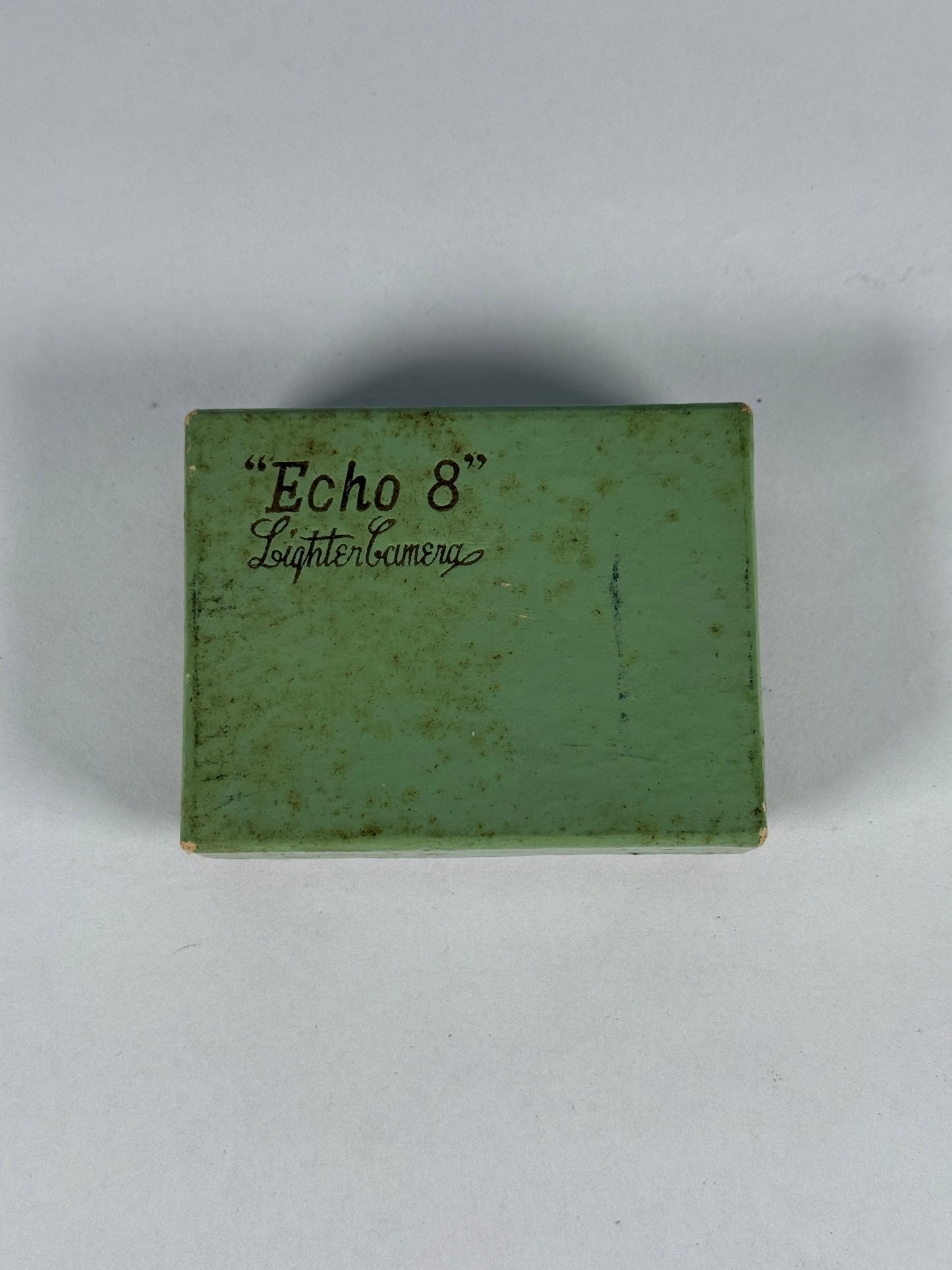 A Suzuki Optical Co. Echo 8 Cigarette Lighter Camera,