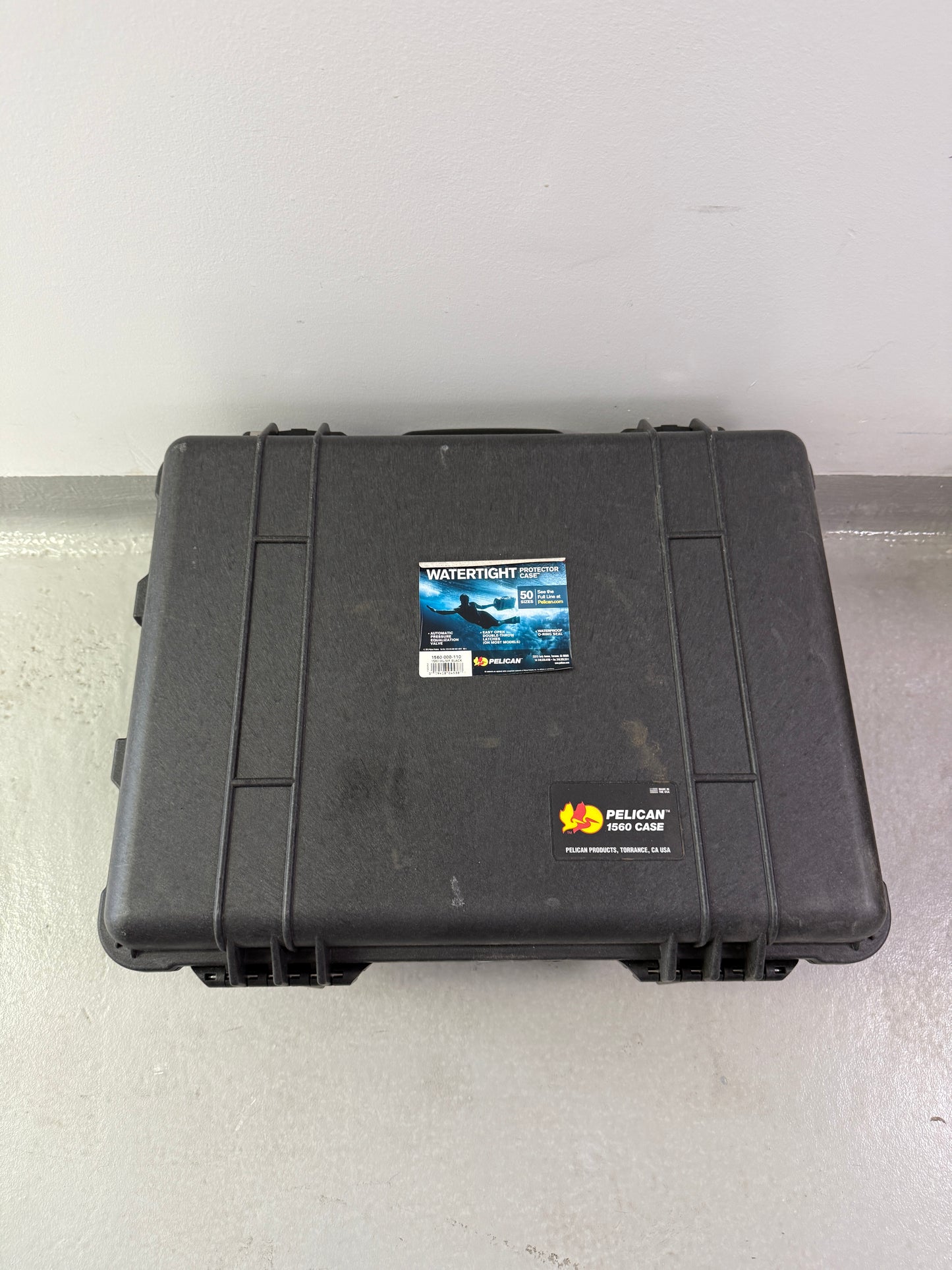 Pelican 1560 Watertight Hard Case with Foam Insert, with Wheels - Black
