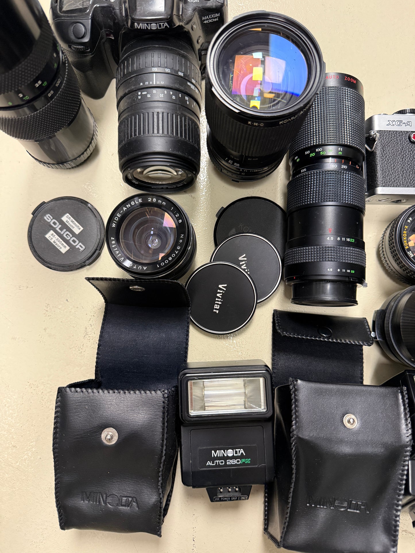 Minolta Film camera MF and AF equipment lot lens, flash