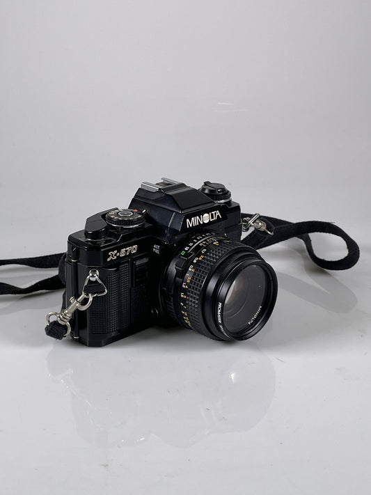 Minolta X-570 Black 35mm SLR Film Camera w/ MD Rokkor-X 50mm f2 Lens kit