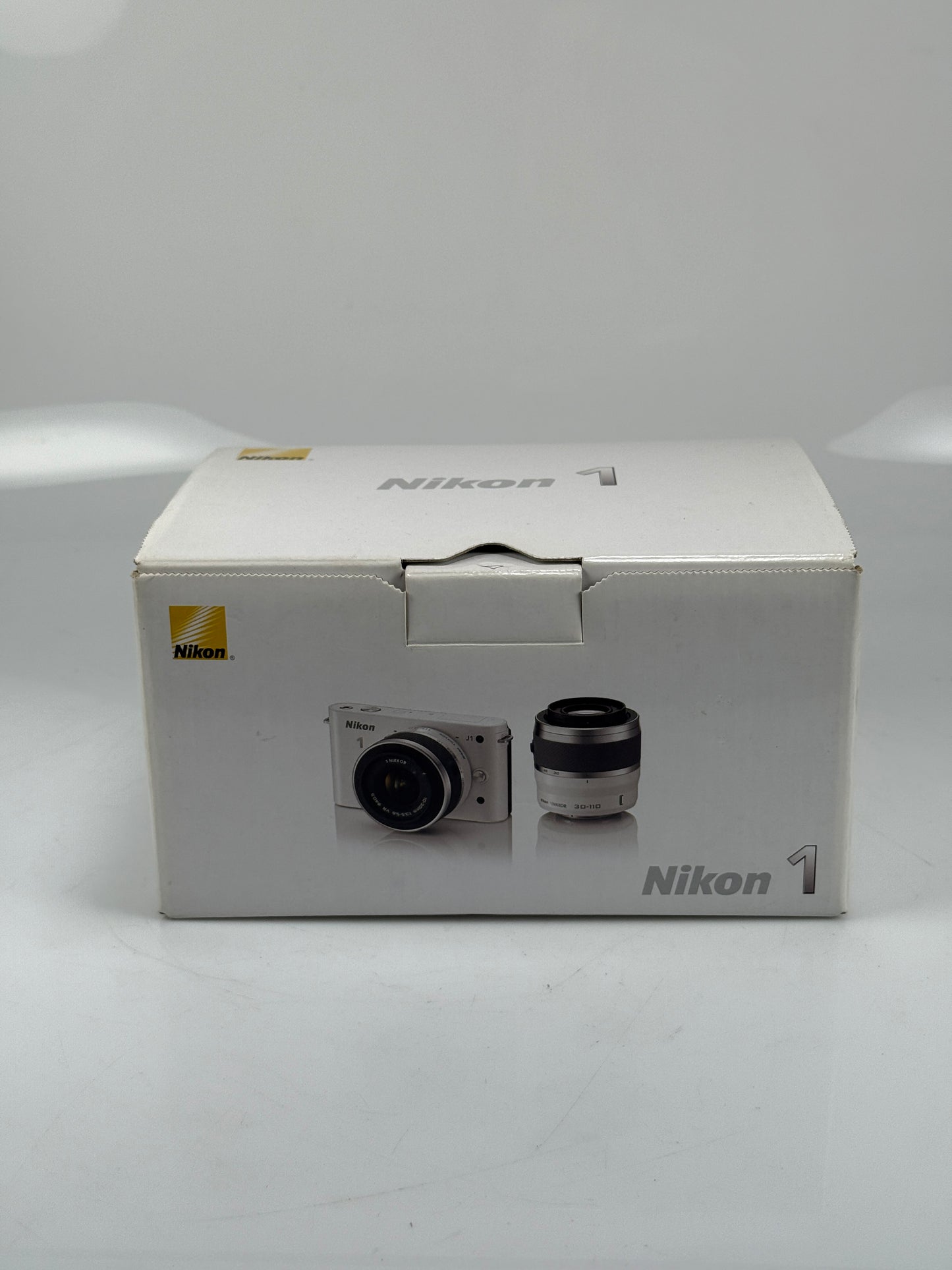 Nikon 1 J1 10.1MP Mirrorless SLR Camera w/ 10-30mm, 30-110mm Lens white