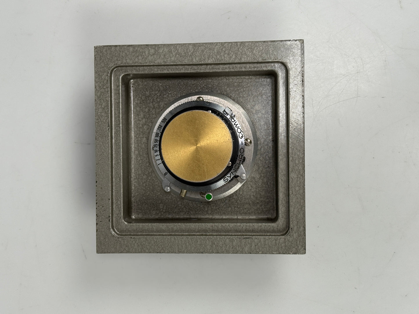 C P Goerz AM Opt Co 3 5/8" WA Dagor f8 Camera Lens gold ring in board