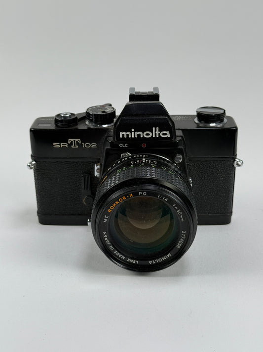 Minolta SRT 102 Black 35mm film camera kit with 50mm f1.4 rokkor-x lens