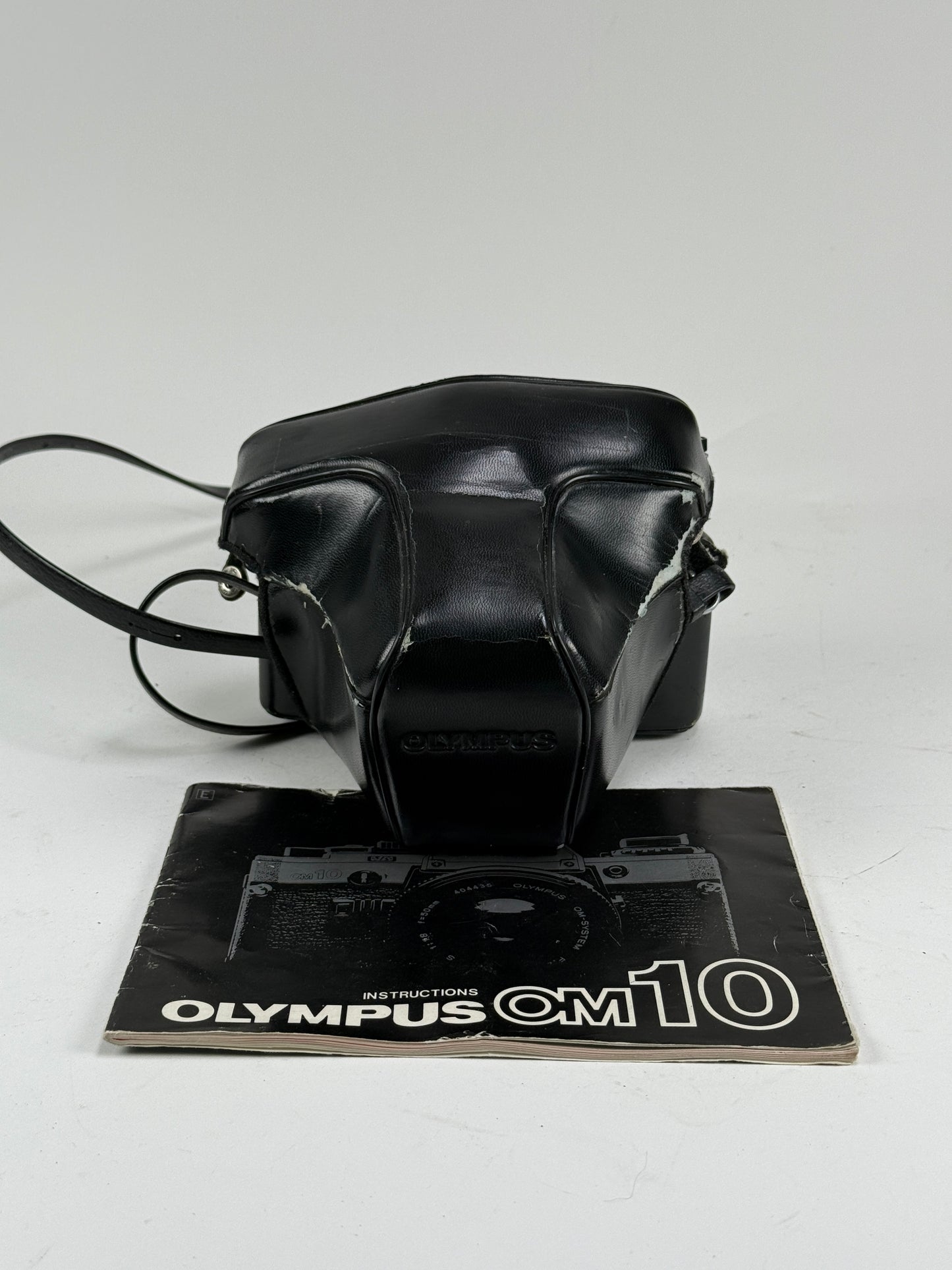 Olympus OM-10 35mm SLR Film Camera with 50mm f1.8 lens kit w/ manual adapter