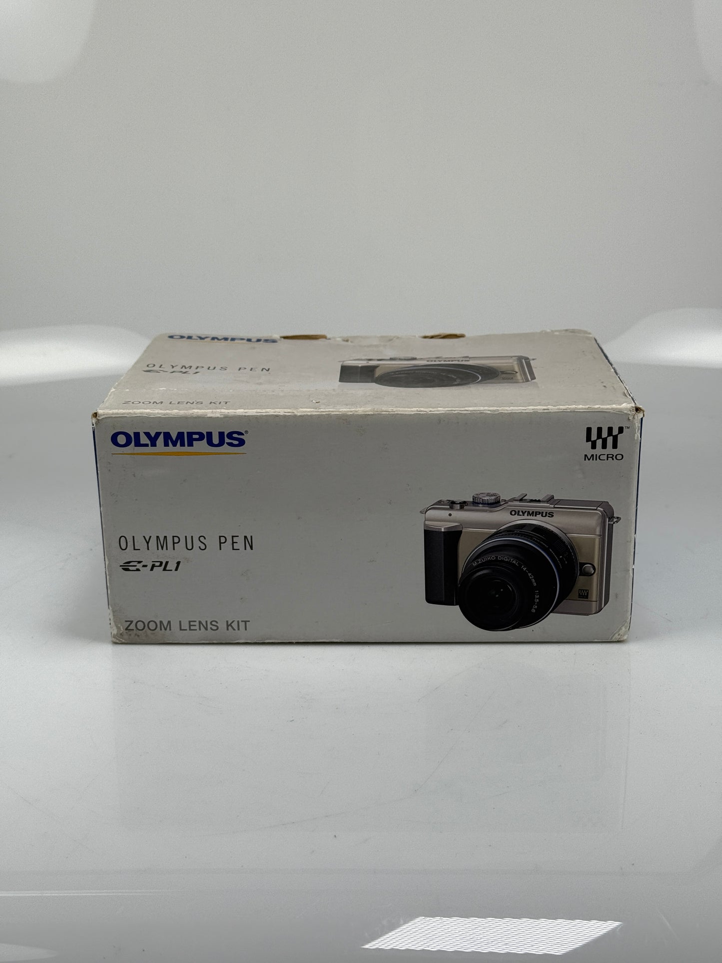 Olympus E-PL1  12.3MP mirrorless digital camera body Silver with 14-42mm L ED lens