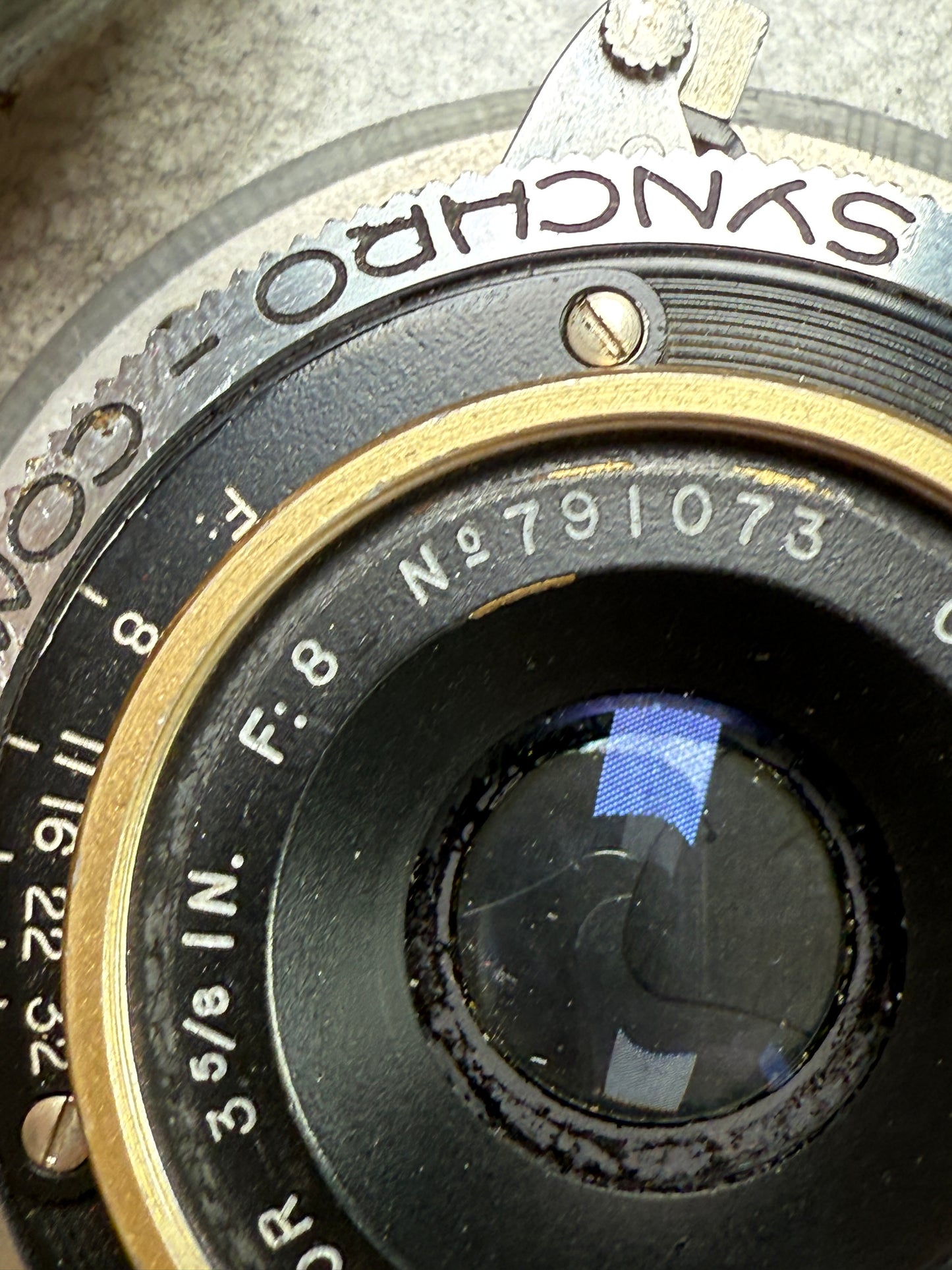 C P Goerz AM Opt Co 3 5/8" WA Dagor f8 Camera Lens gold ring in board