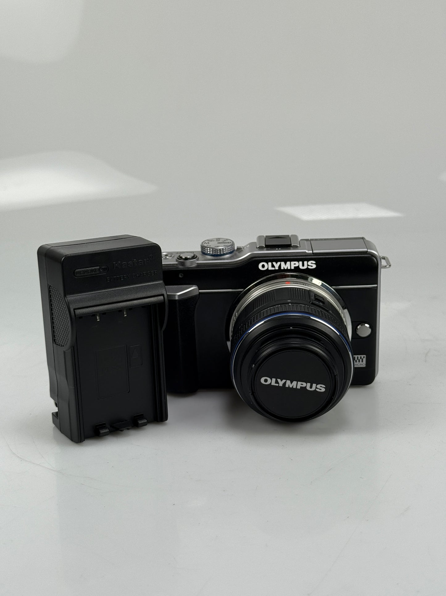 Olympus E-PL1  12.3MP mirrorless digital camera body black with 14-42mm L ED lens