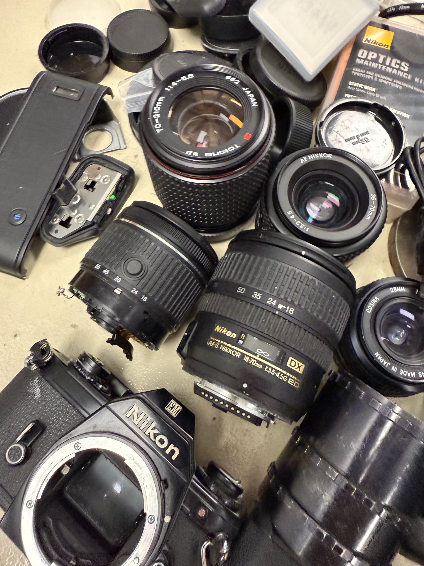 Nikon Film camera equipment lot lens, flash, caps, hood, strap