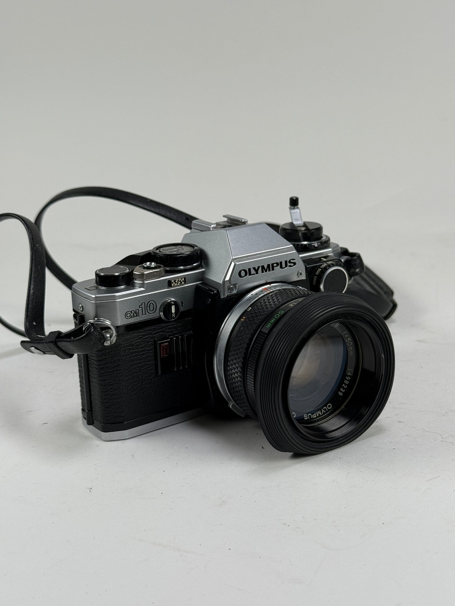 Olympus OM-10 35mm SLR Film Camera with 50mm f1.8 lens kit w/ manual adapter