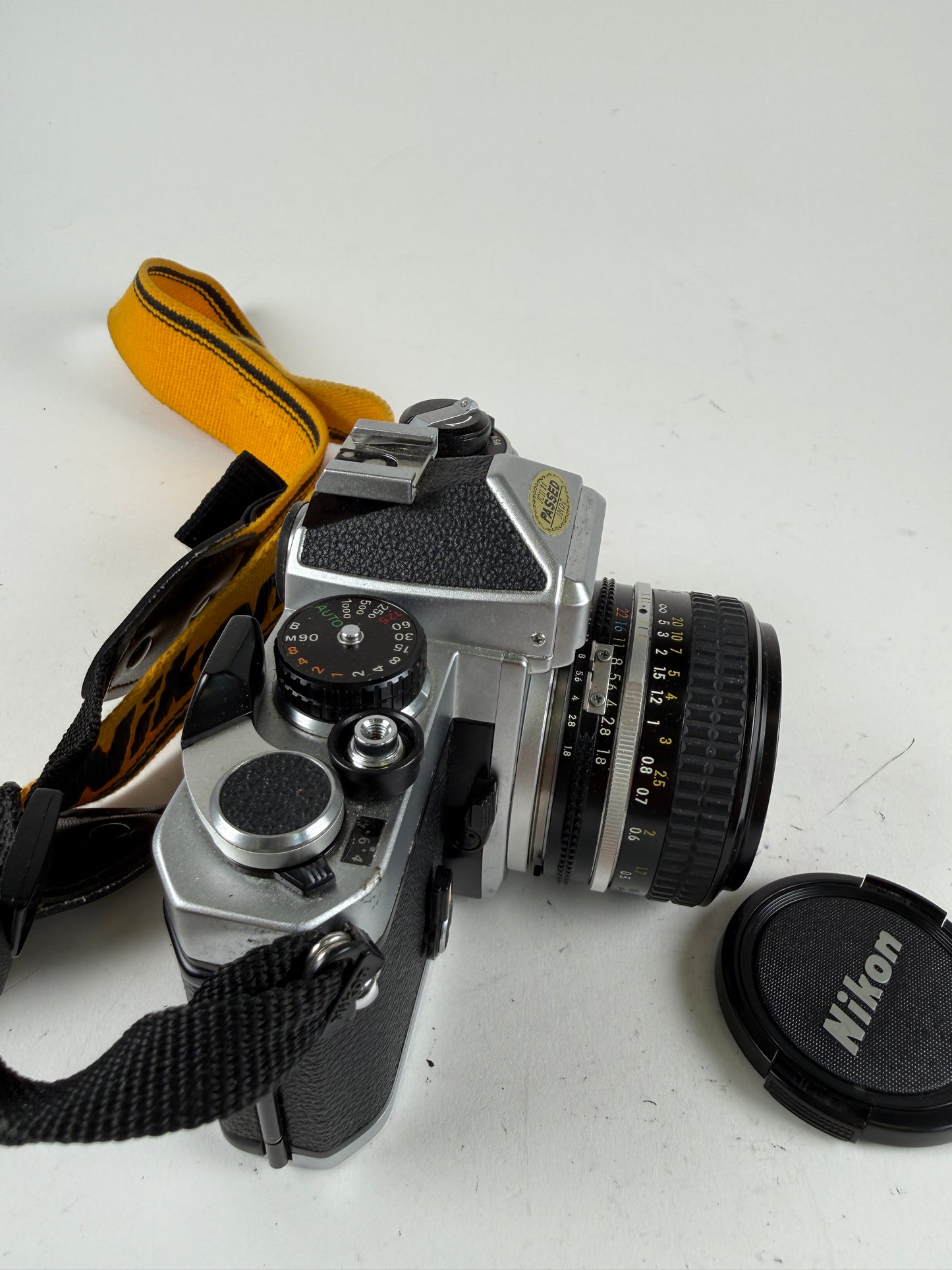 Nikon FE Chrome 35mm SLR Film Camera Body w/ 50mm f1.8 ais lens