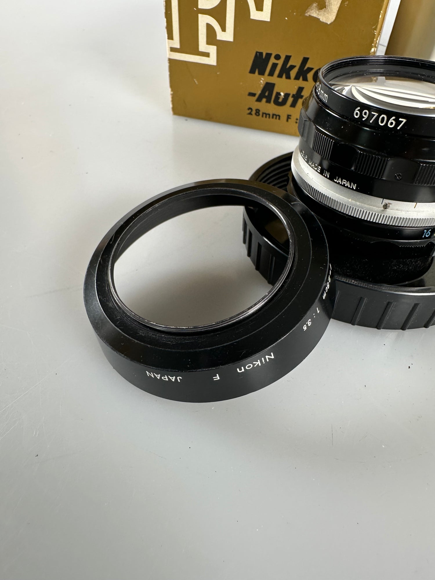 Nikon NIKKOR-H Auto 28mm f3.5 Non Ai Lens w/ case, Hood – Cardinal Camera  Used