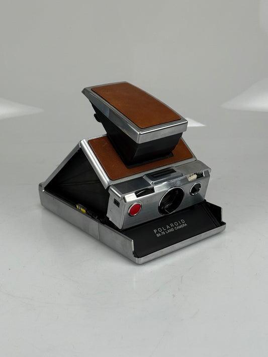 Polaroid SX-70 film land camera tan and chrome