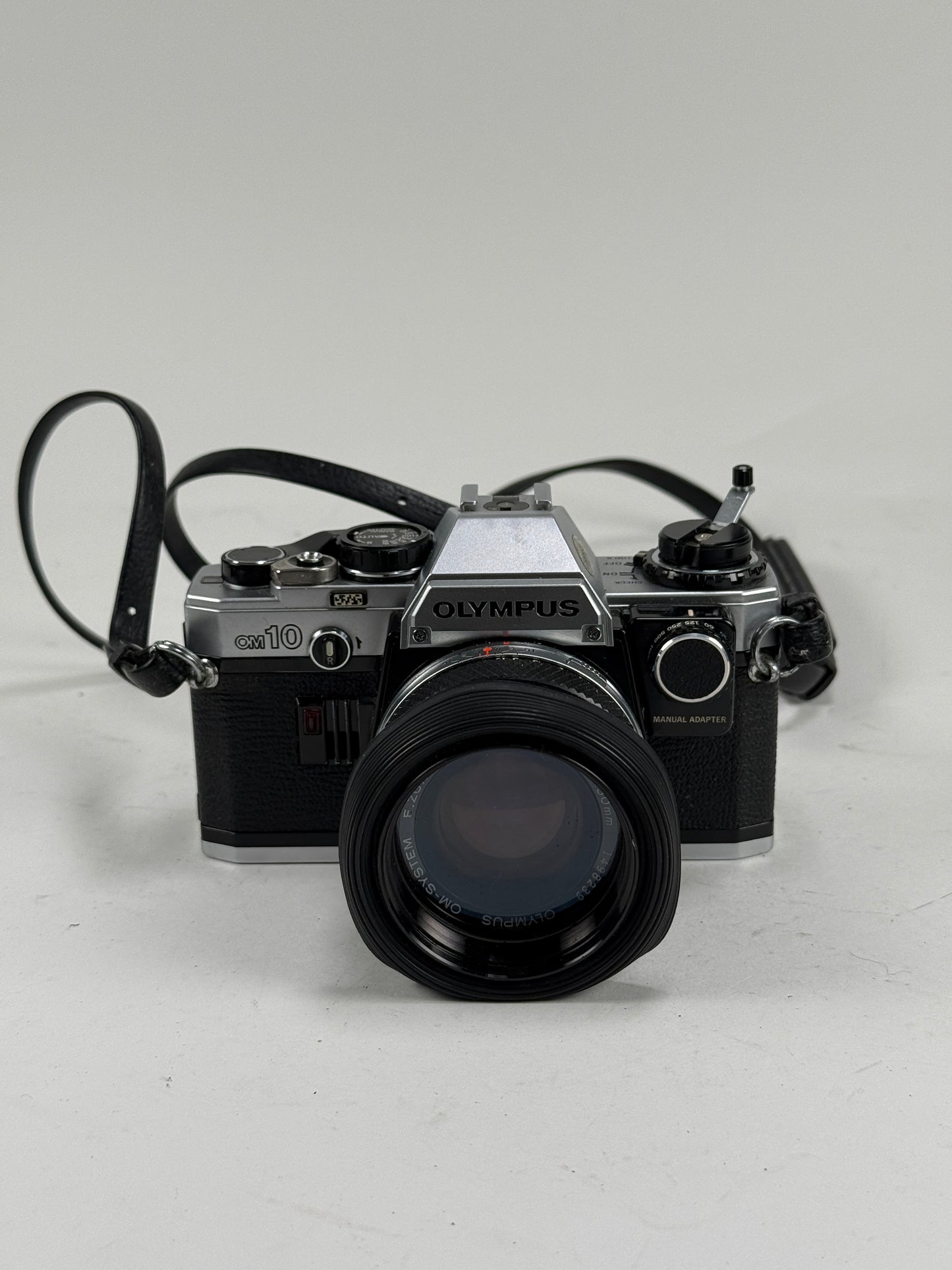 Olympus OM-10 35mm SLR Film Camera with 50mm f1.8 lens kit w/ manual adapter