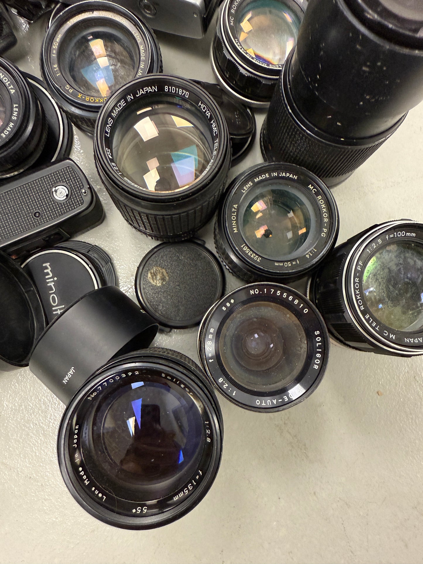 Minolta Film camera equipment lot lens, 135mm, 100mm f2.5, 58mm, 50mm, SRT