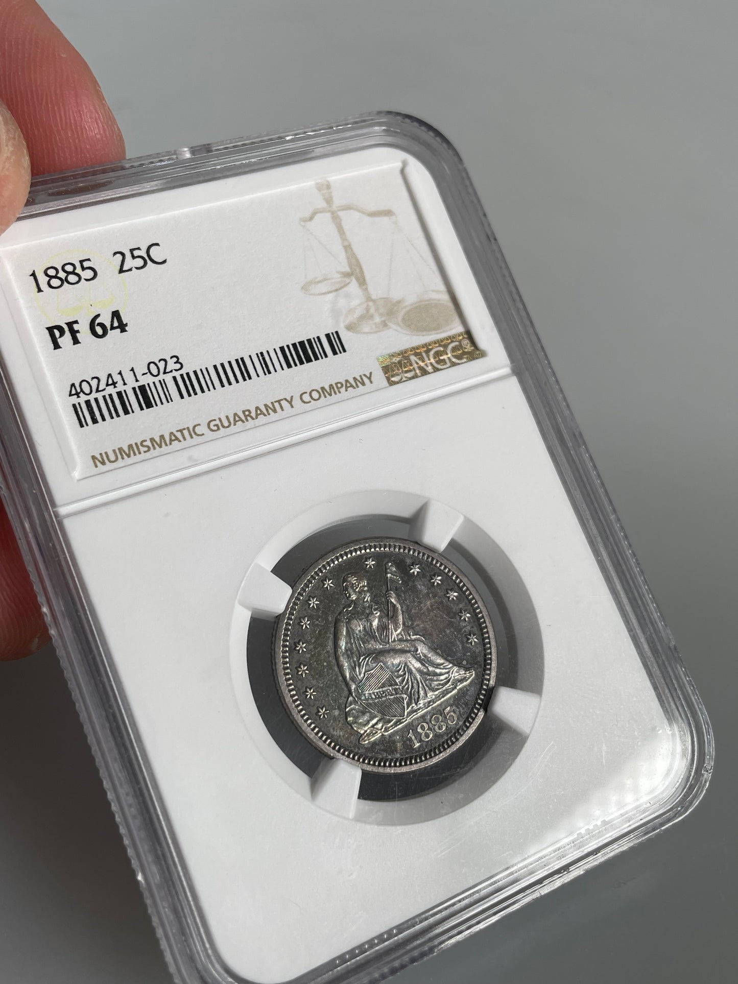 1885 Seated Liberty Quarter NGC PR64 - Toned Proof 25c