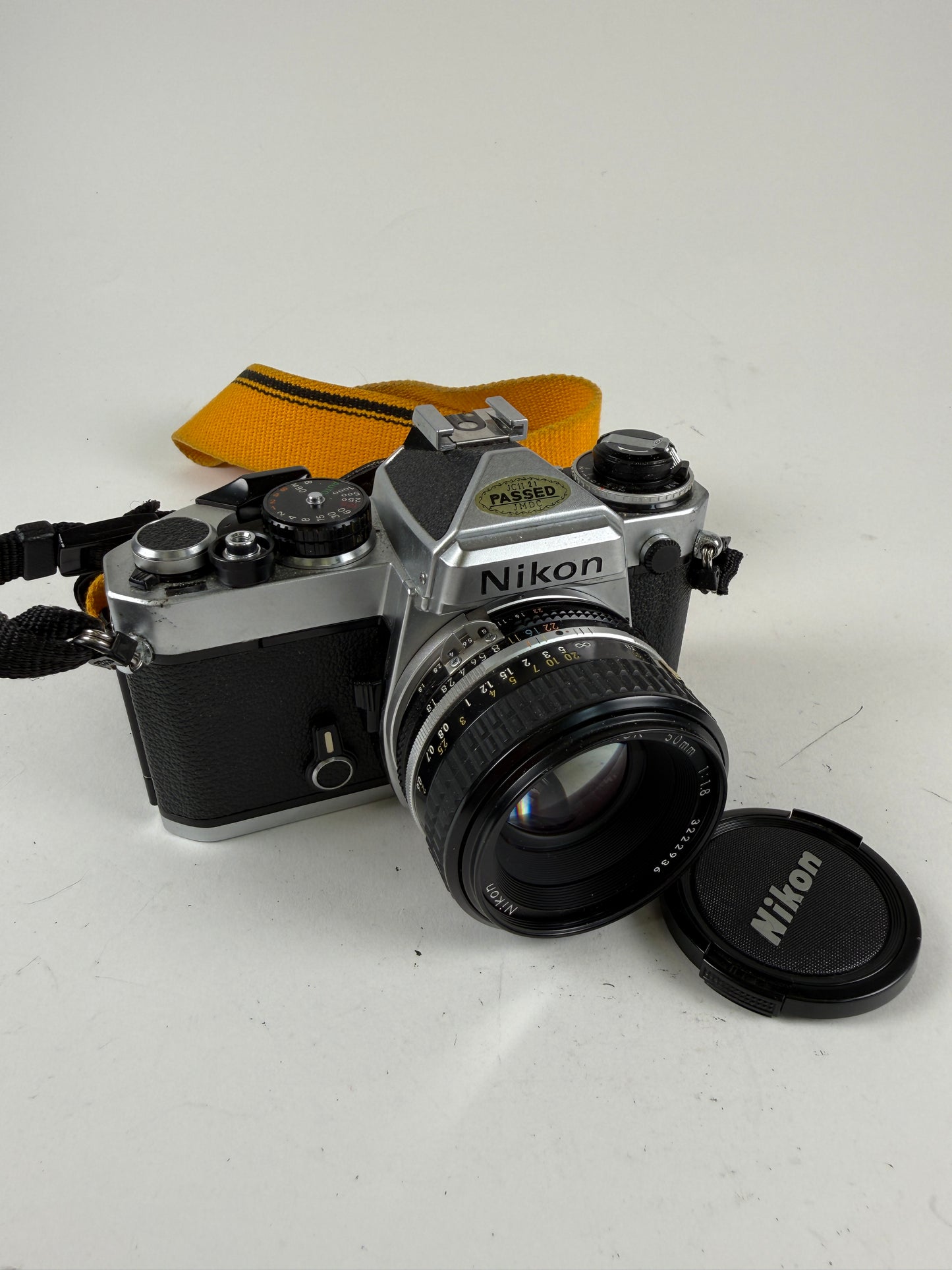 Nikon FE Chrome 35mm SLR Film Camera Body w/ 50mm f1.8 ais lens