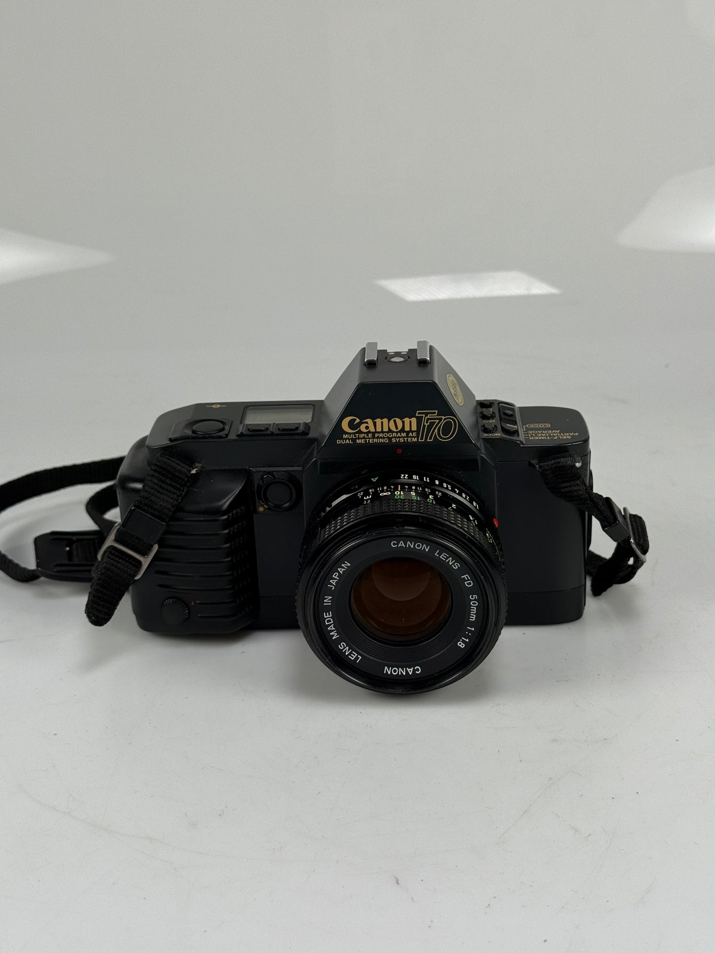 Canon T70 35mm MF Film SLR Camera kit with 50mm f1.8 FD