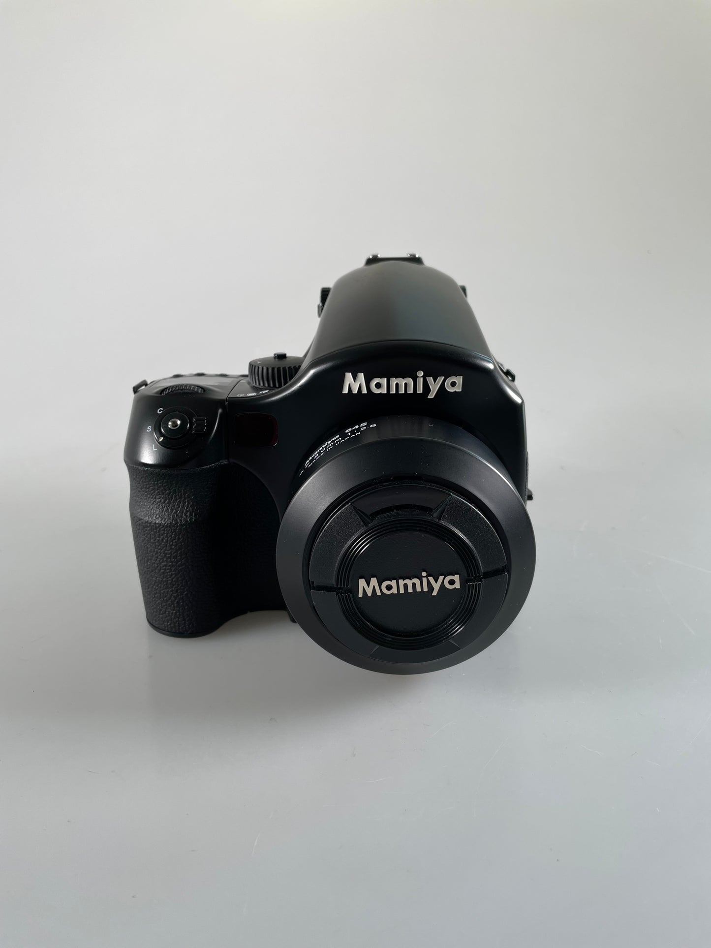 Mamiya 645 AFd medium format film camera with 80mm f2.8 lens, Polaroid back